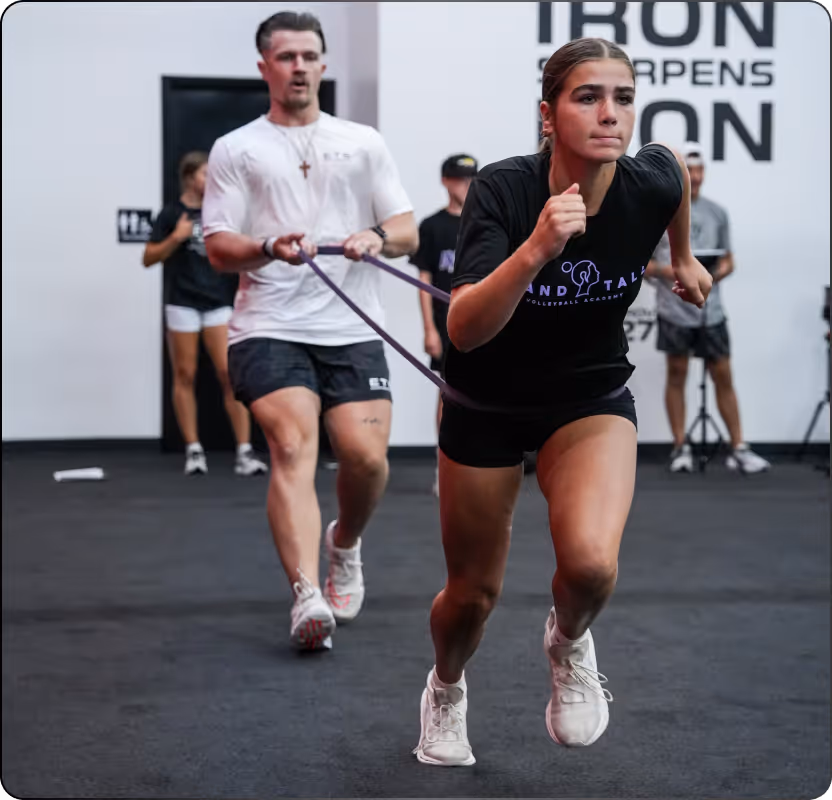 Athletes running together during group training at ETS Performance