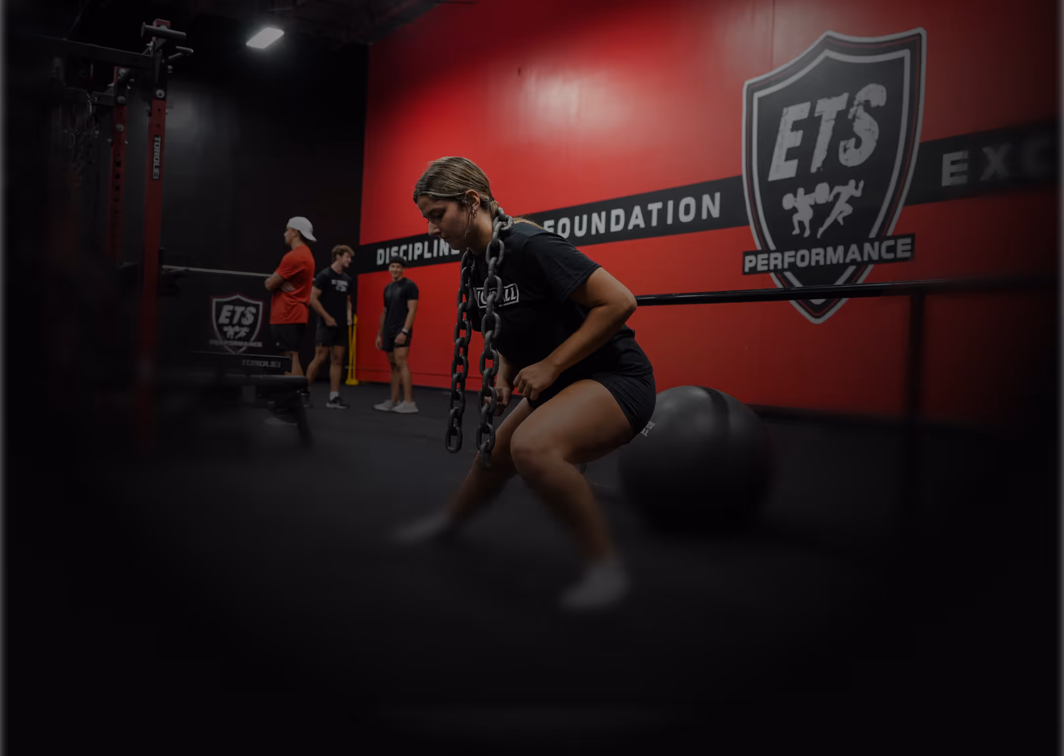 Athlete performing speed and strength training inside an ETS Performance facility