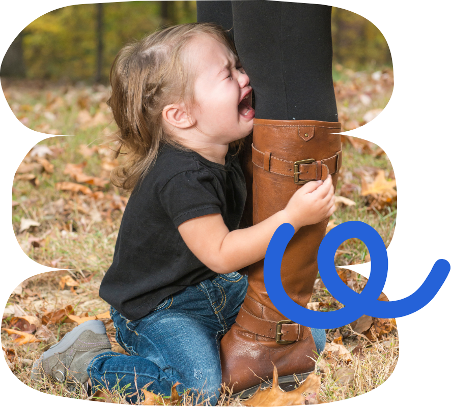 A mother and daughter sitting together on a couch, having a disagreement.