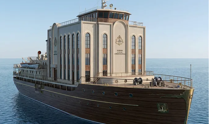 Large wooden ship with a multi-story cream-colored building structure featuring arched windows on its deck, floating on a calm sea under a clear sky.