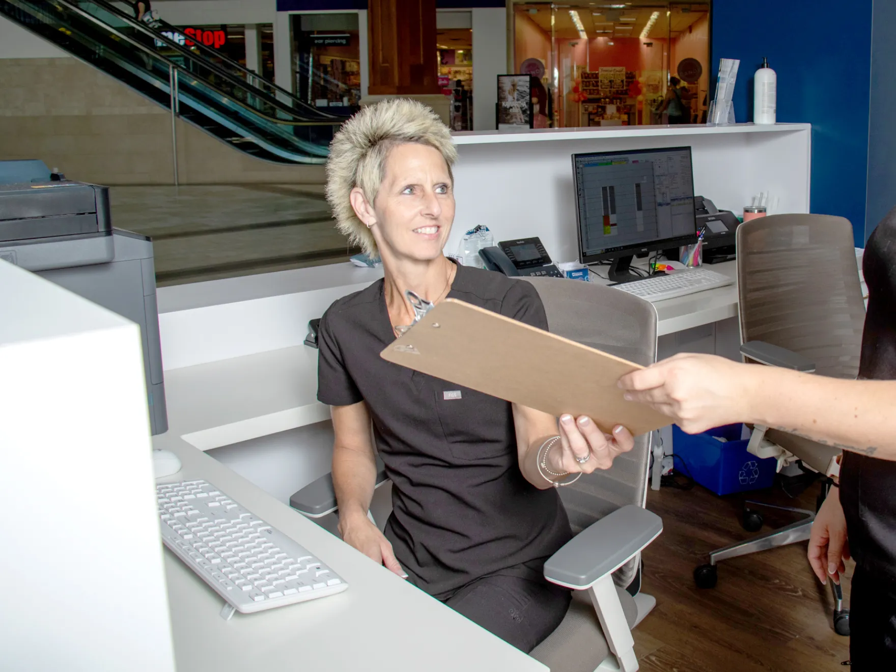 Cheryl receiving insurance information