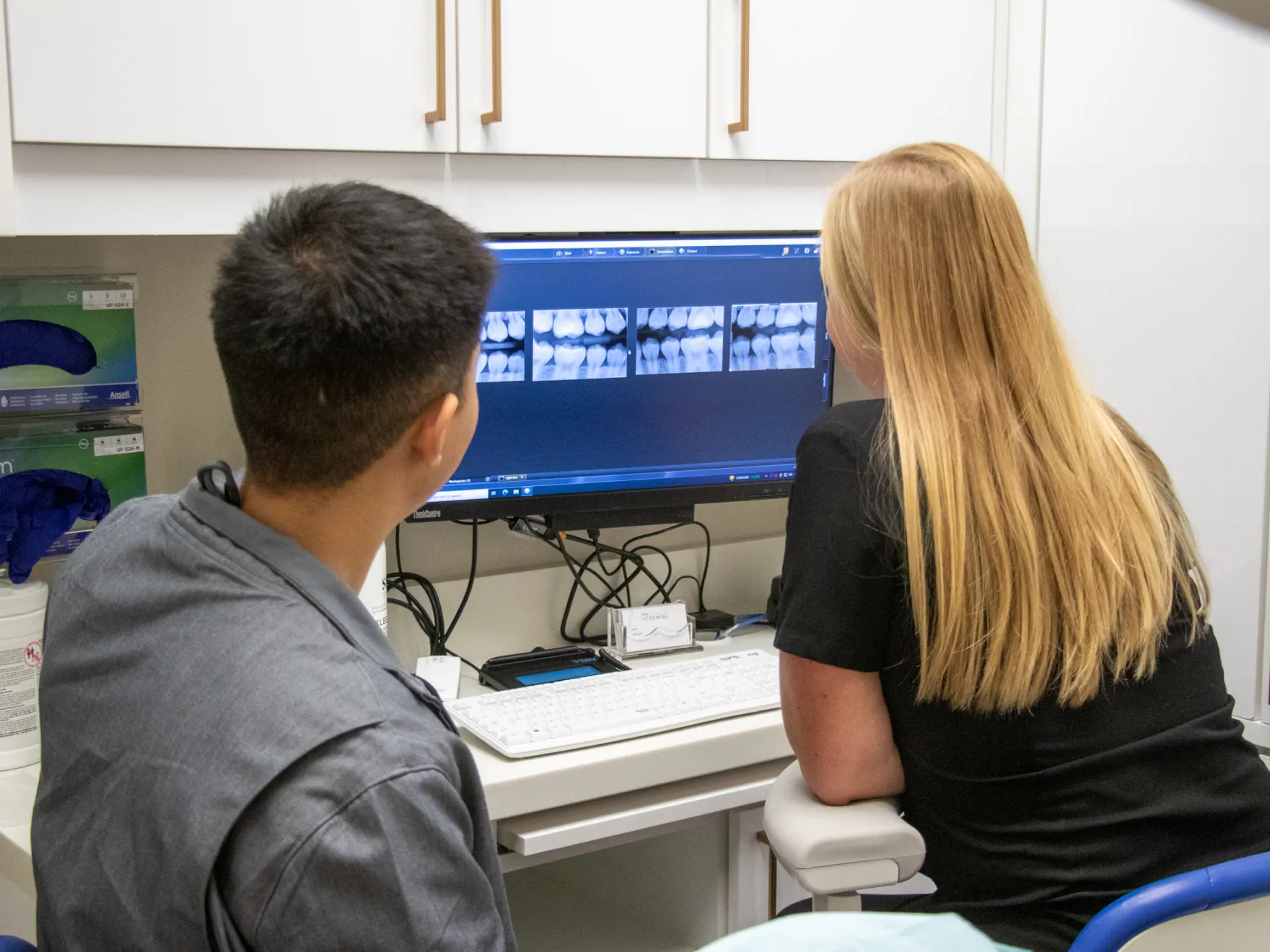 Dr. Yoon and Cassidy looking at some x-ray images