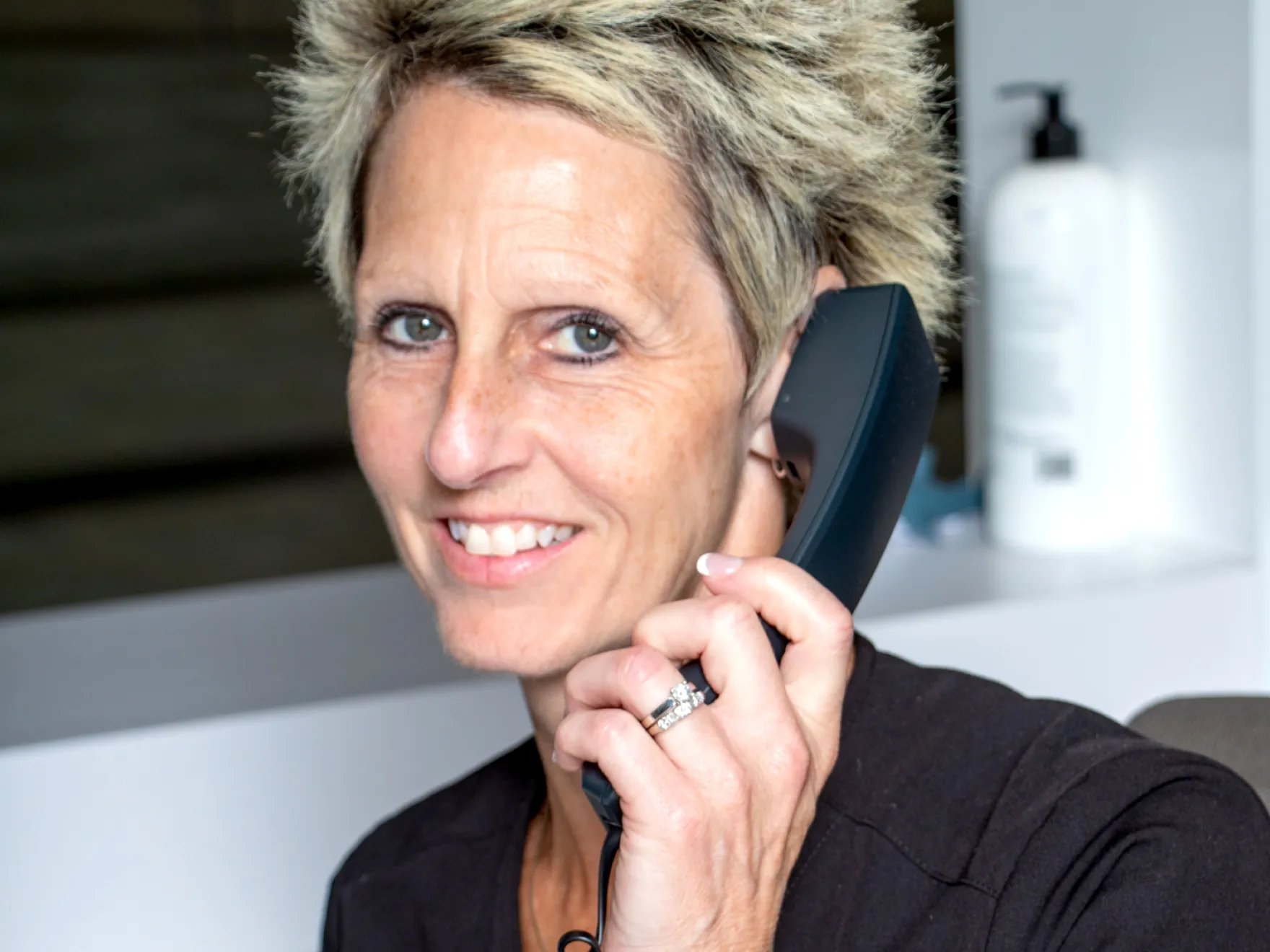 Cheryl answering the phone