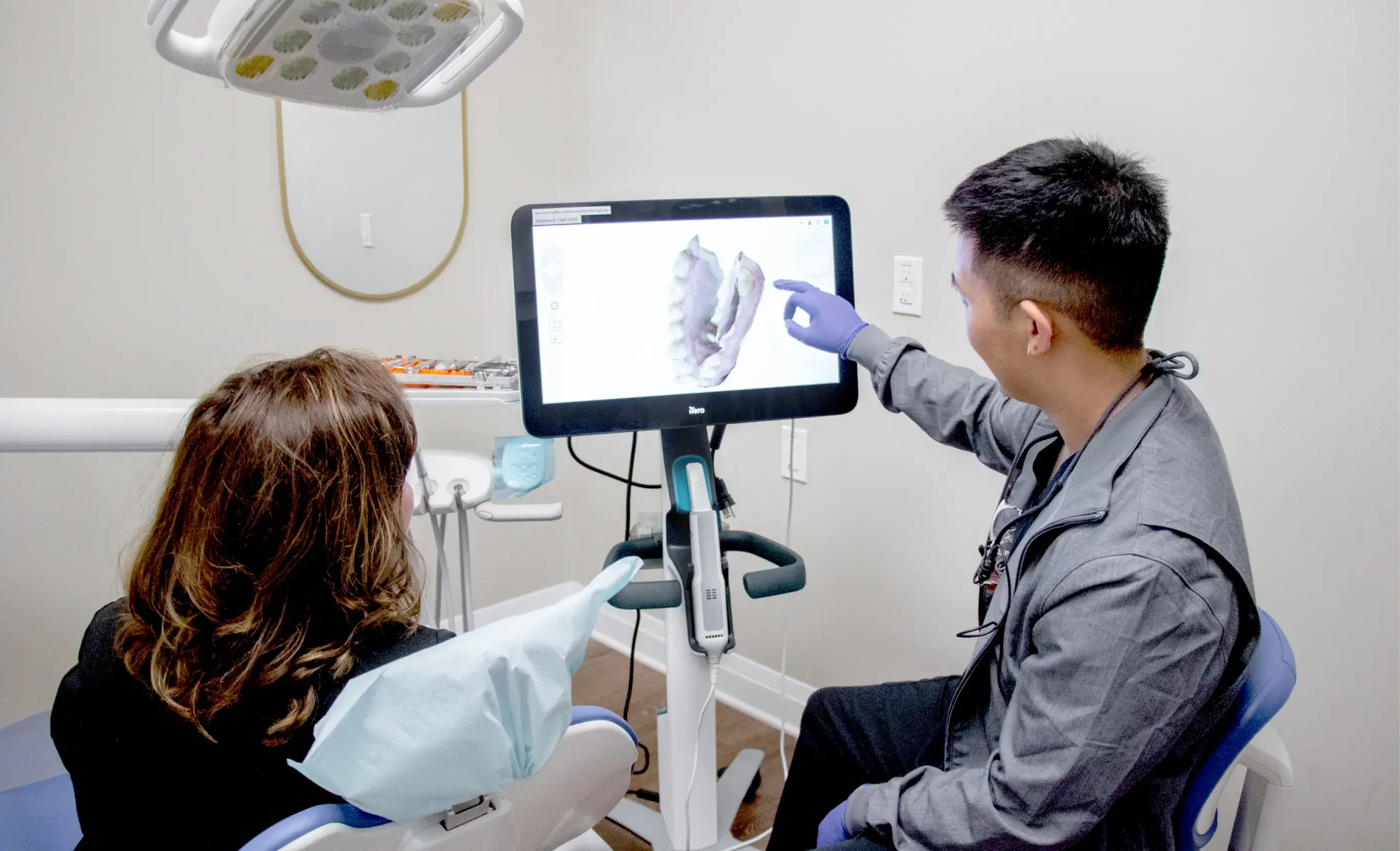 Dr. Yoon showing 3d imaging to patient