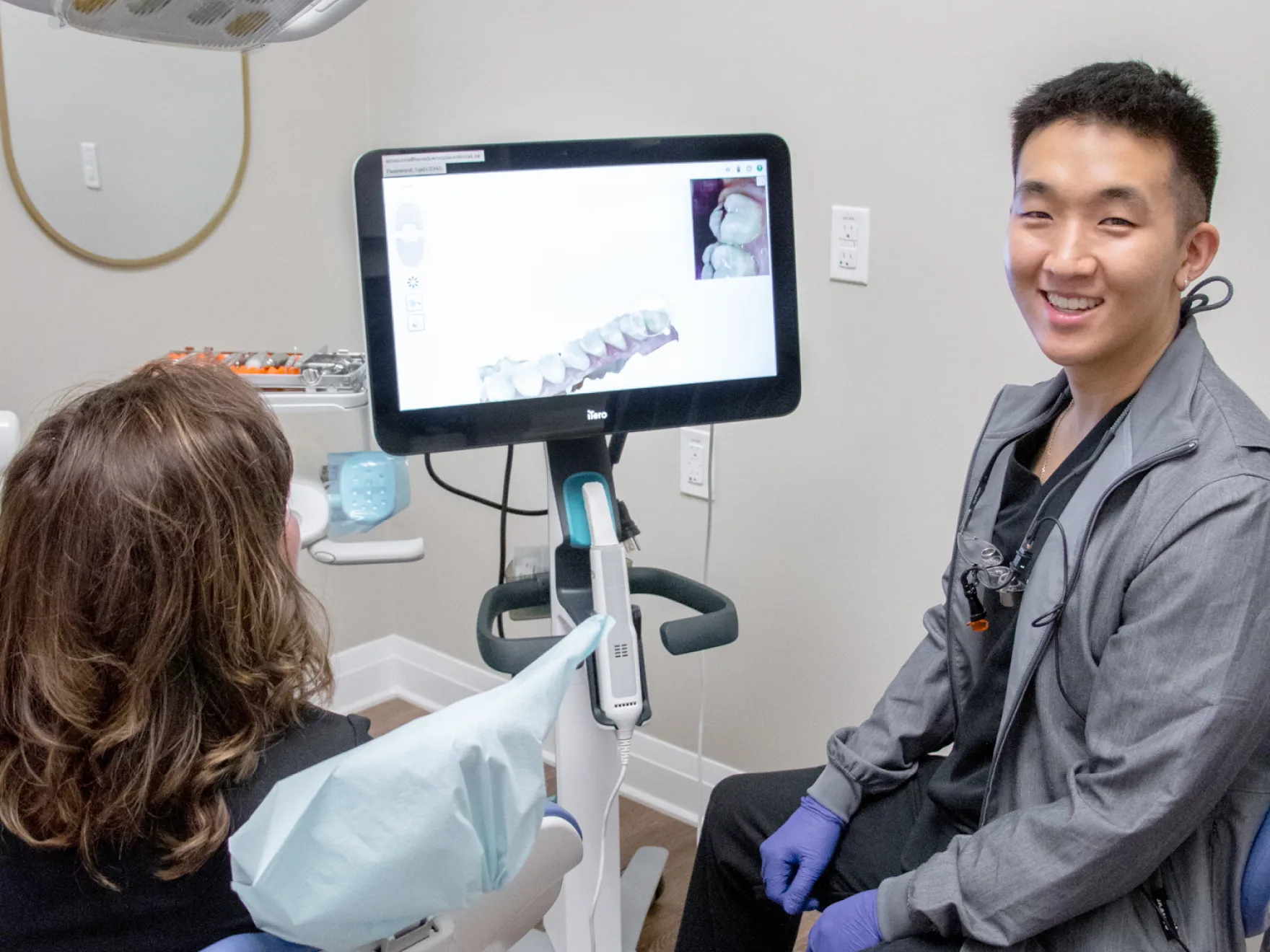 Dr. Yoon showing a 3D image to a patient