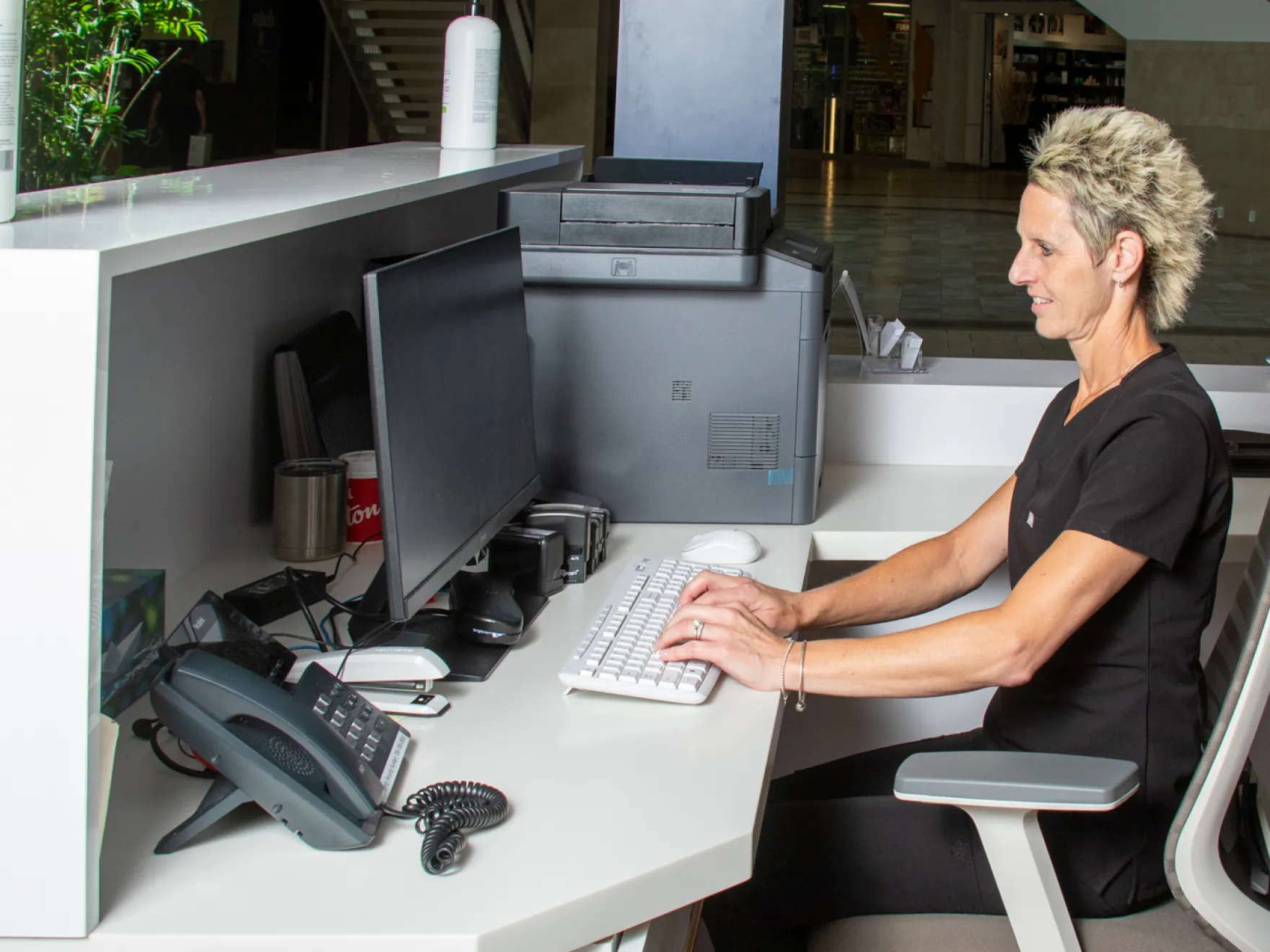 Team member working on the computer