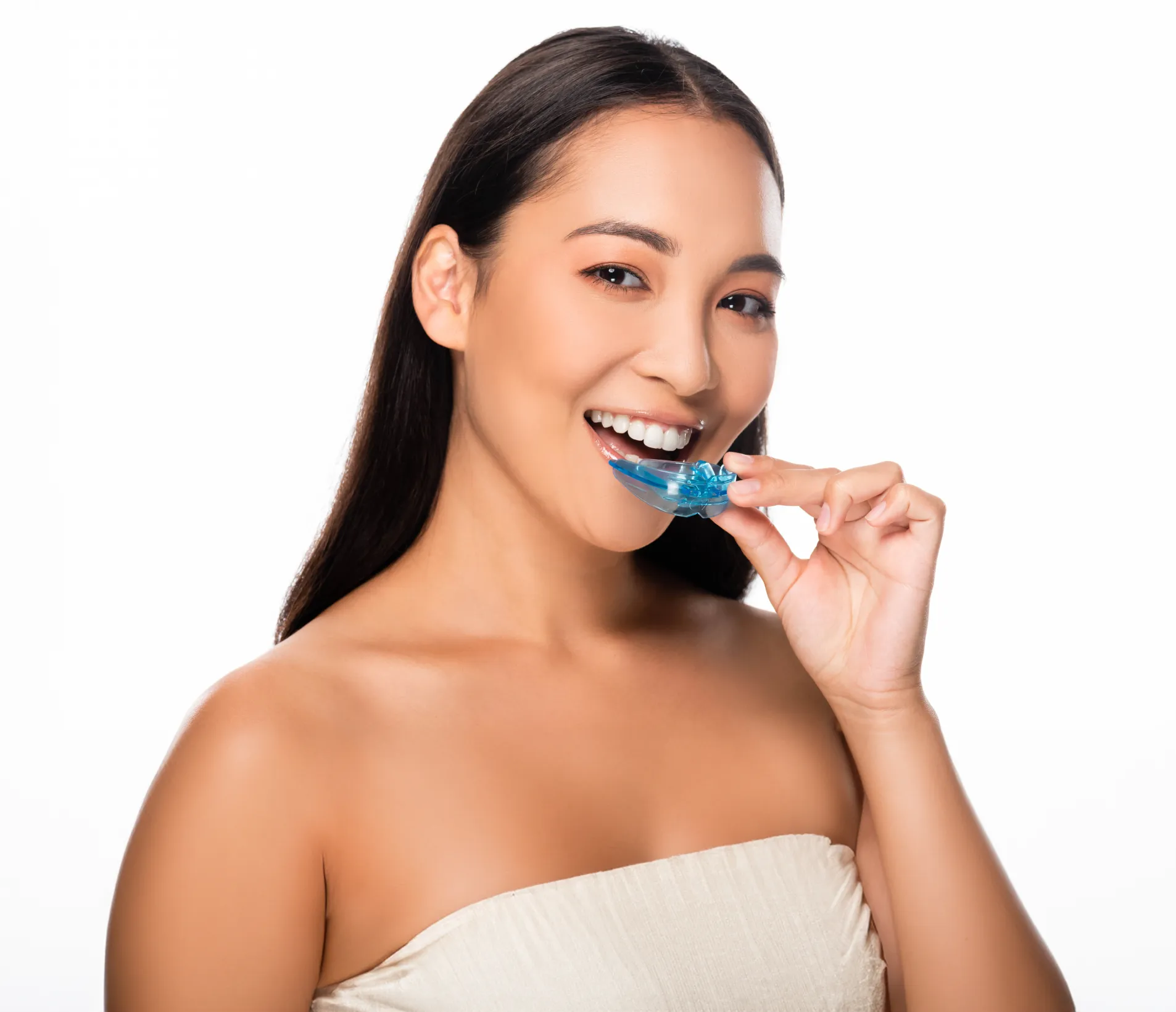 Woman holding a dental guard
