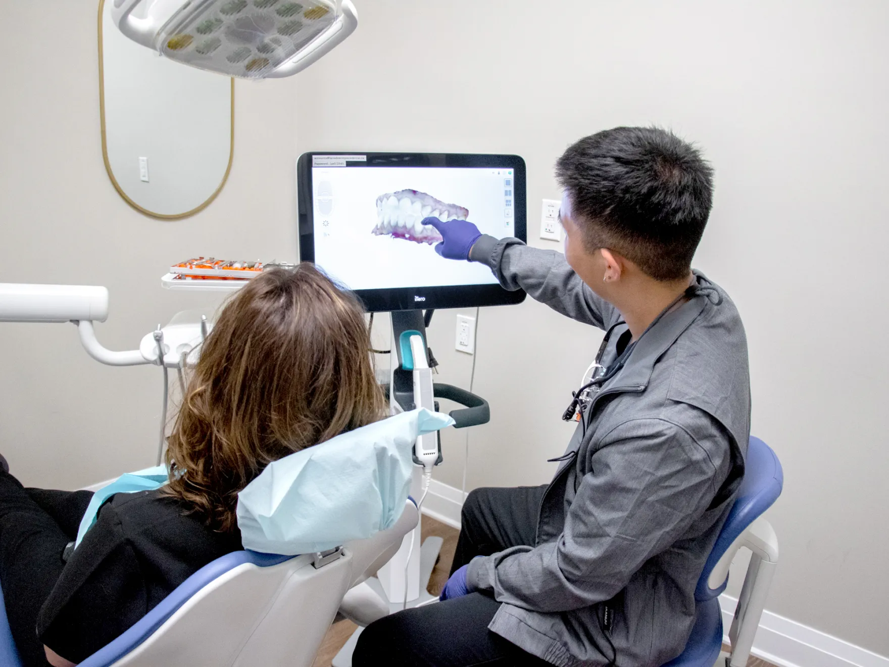 Dr. Yoon showing 3D image to patient