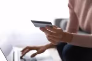 Business traveler booking travel online