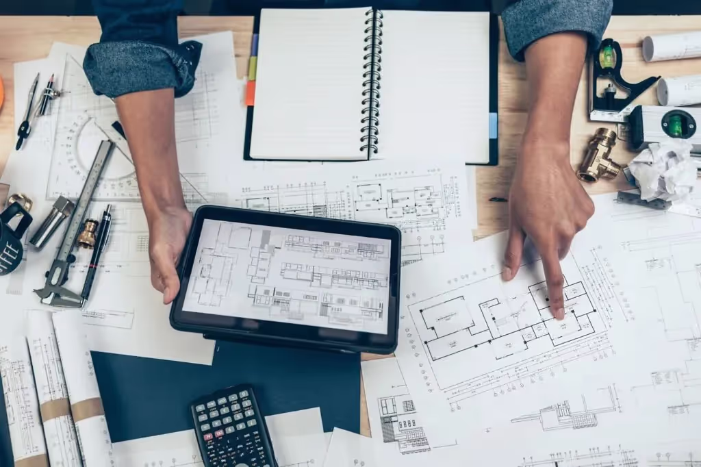 Professional using drawing floor plan construction app