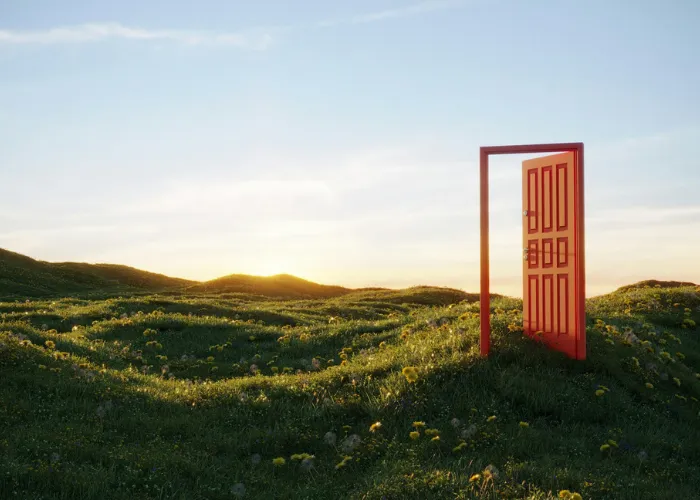 Abstract green grass waves with white flower accents