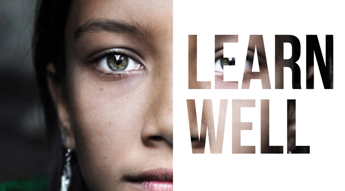 Close-up of a young person's face with green eyes beside the text 'LEARN WELL' filled with a faded image of the same face.