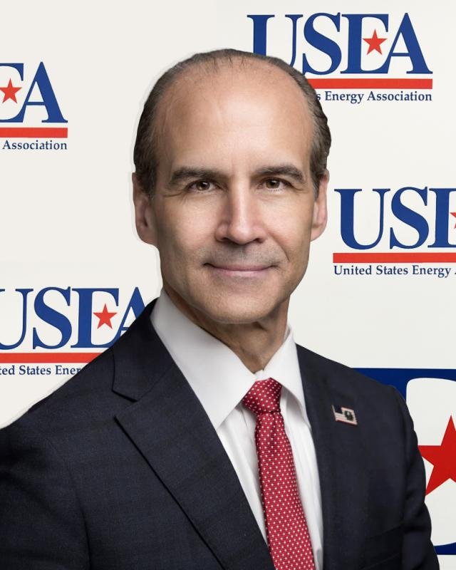 Hon. Mark Menezes