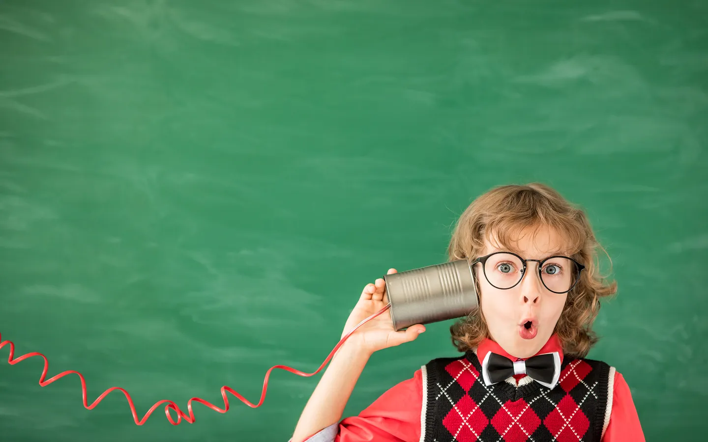 Child wearing glasses for clear vision and confident communication at school