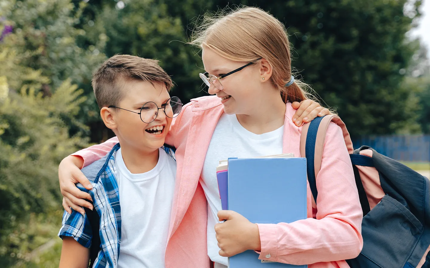 School children wearing prescription glasses for myopia control and vision correction