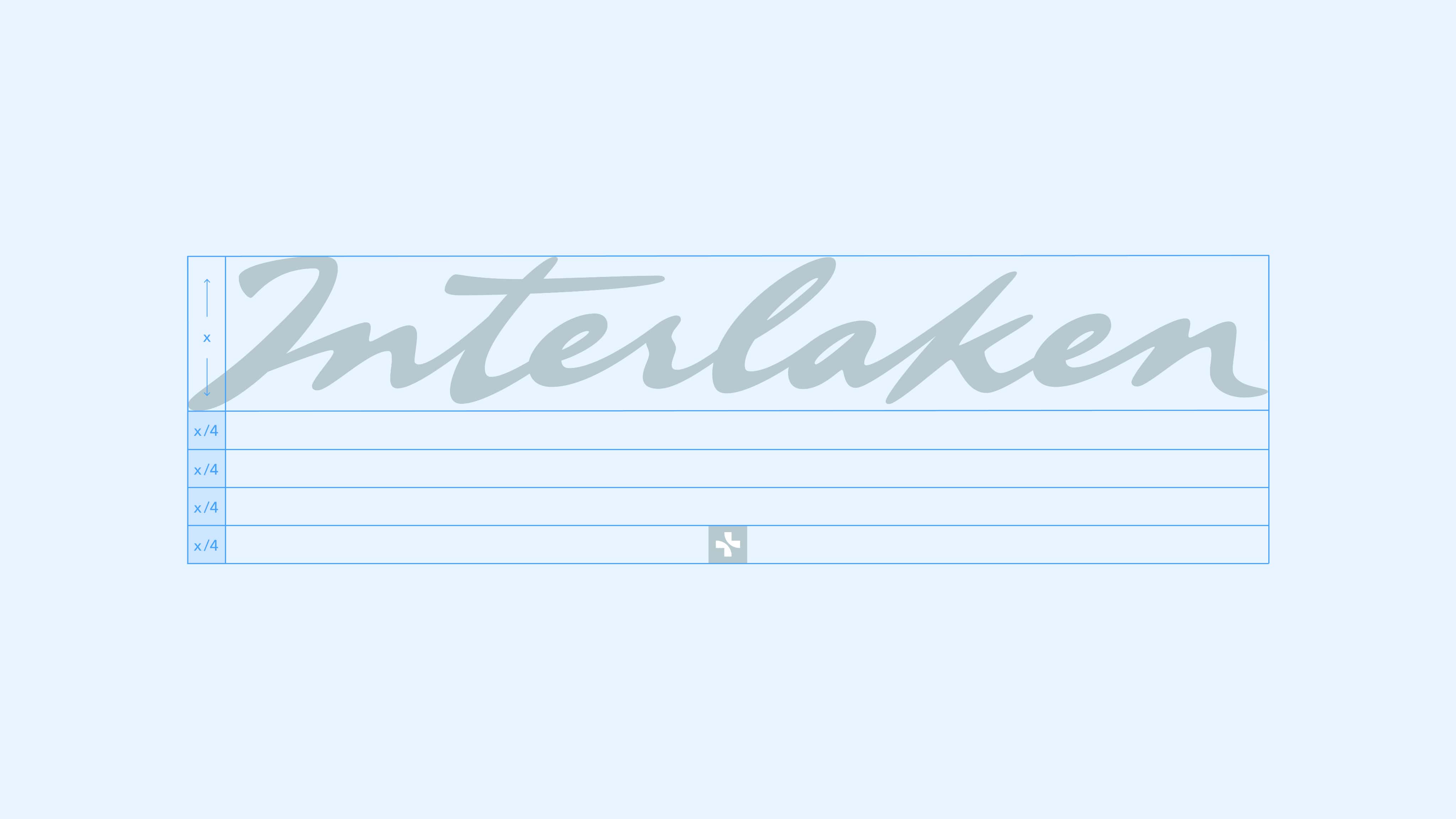 Handgeschriebener Schriftzug «Interlaken» in hellgrauer Farbe auf weißem Hintergrund.