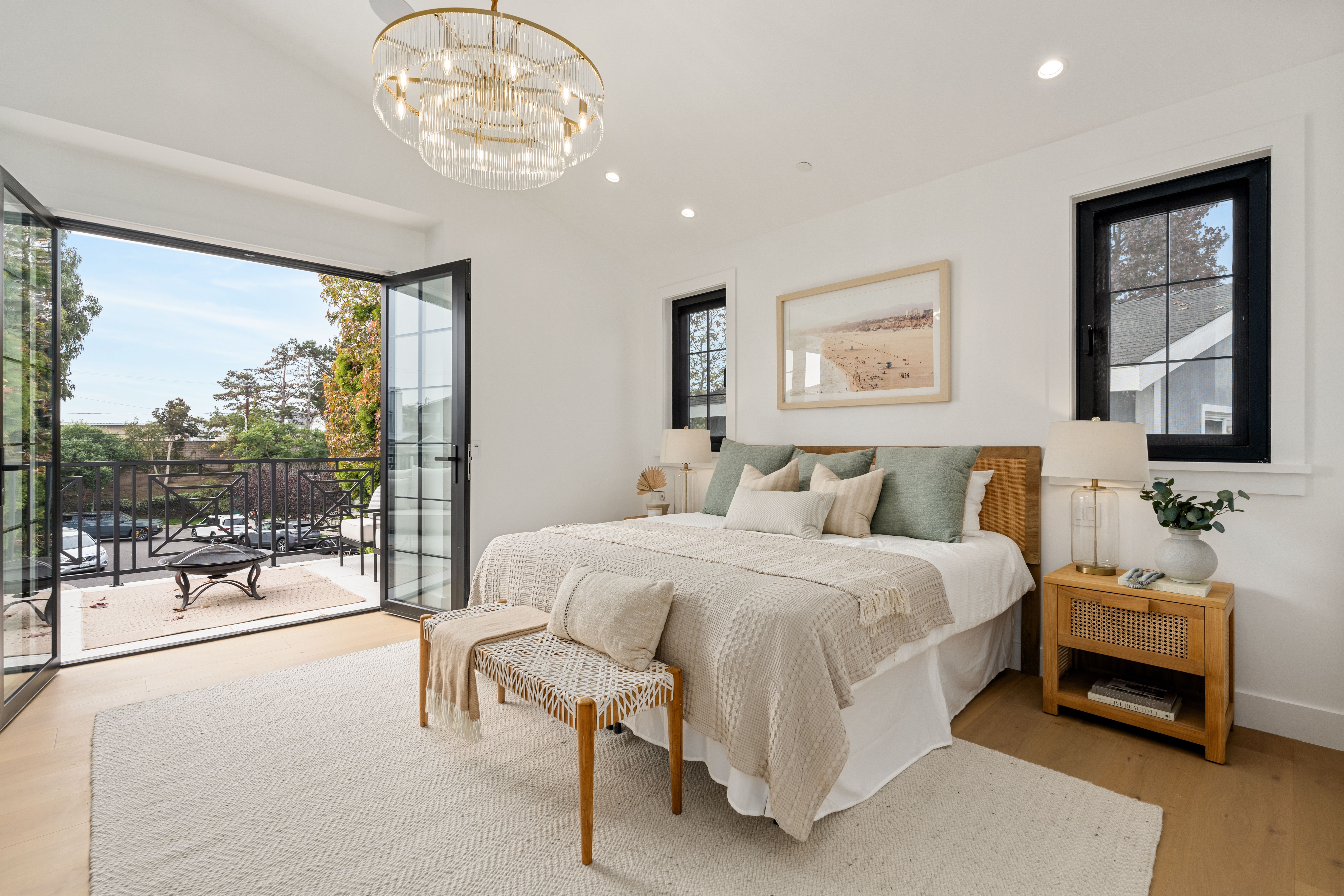 Bright Magnolia Residence bedroom with soft neutral finishes and access to outdoor air and daylight.