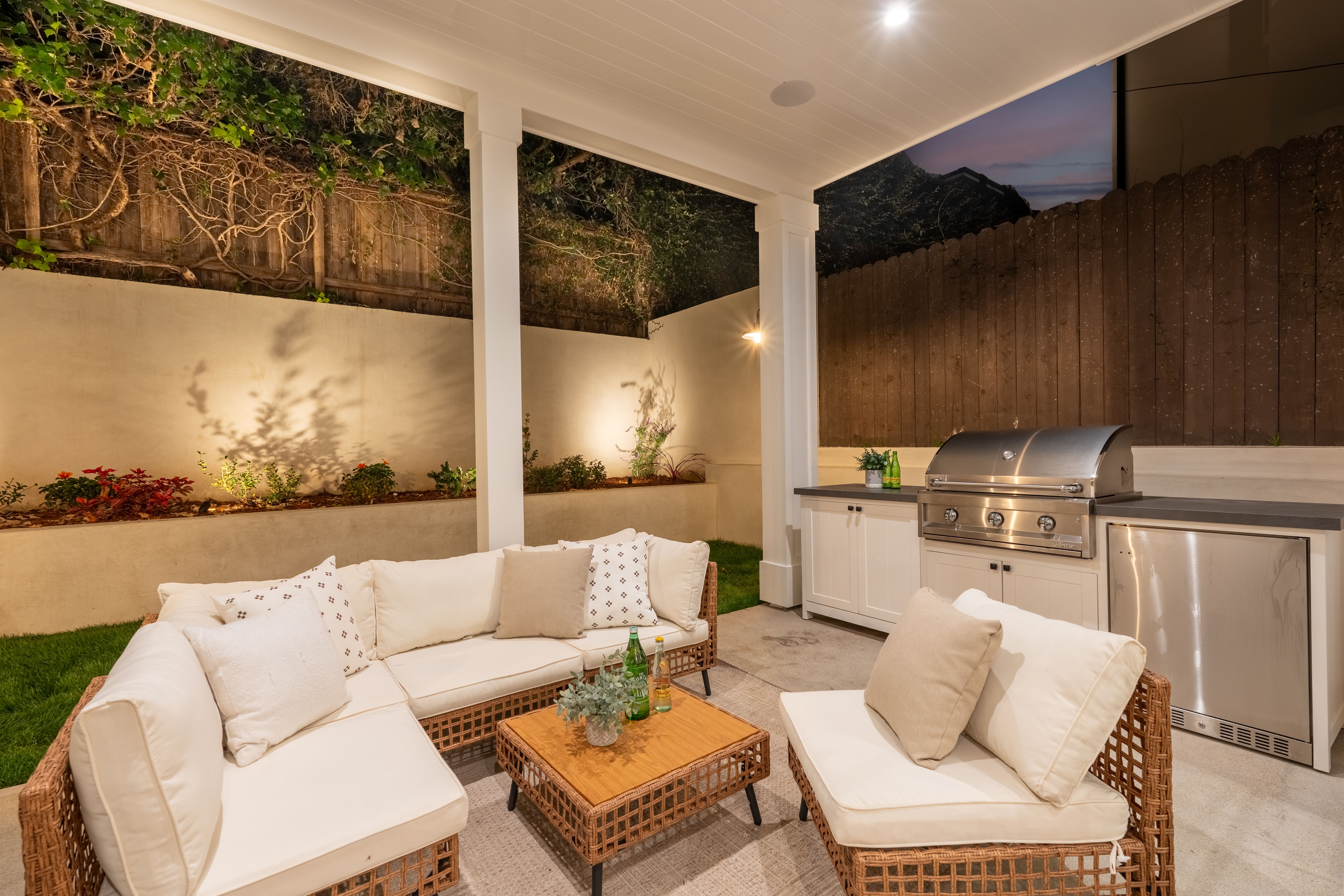 Outdoor terrace at Magnolia Residence set up for relaxed coastal entertaining.