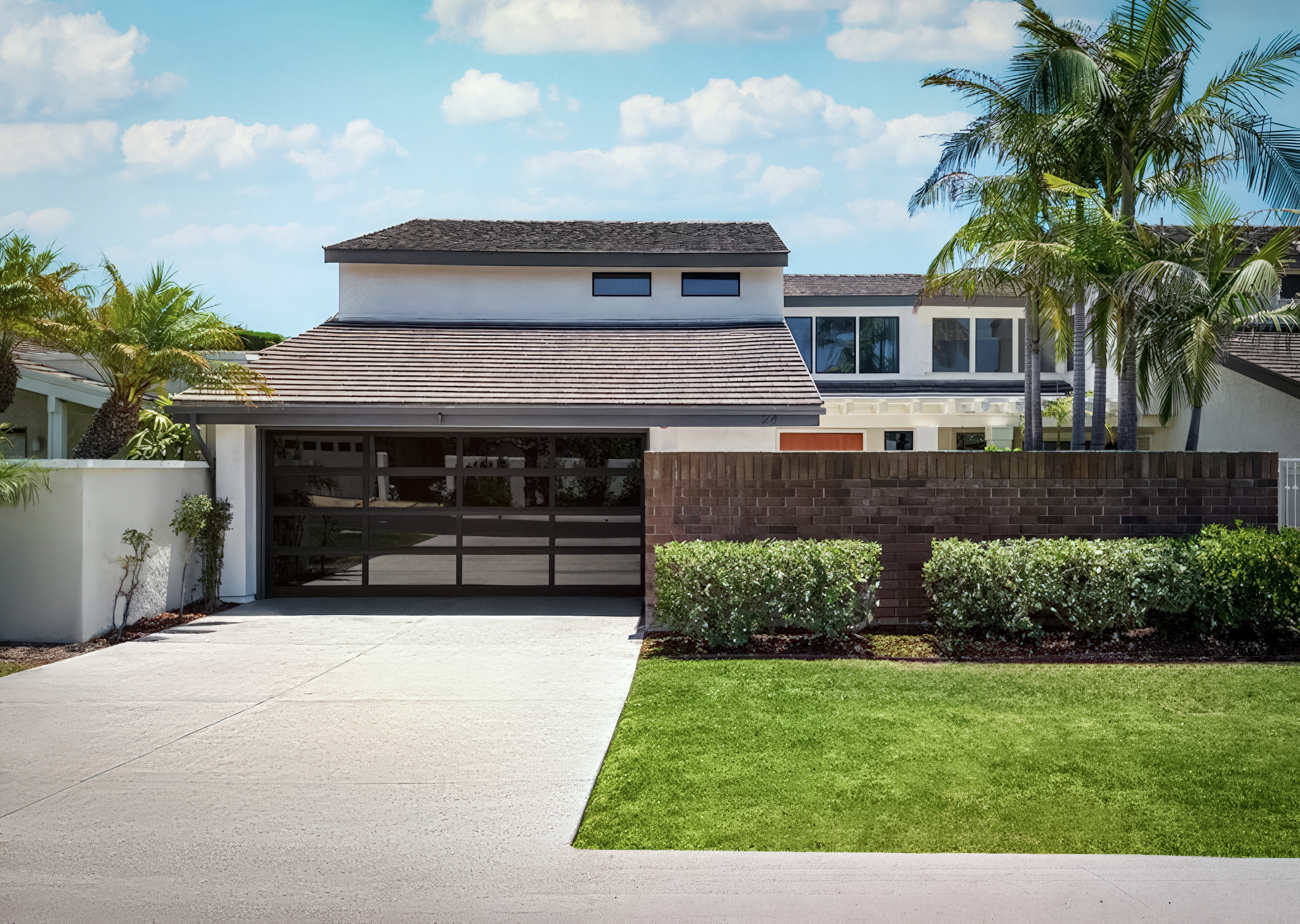 Whitewater Residence exterior in Newport Beach with clean white architecture and a private outdoor terrace.