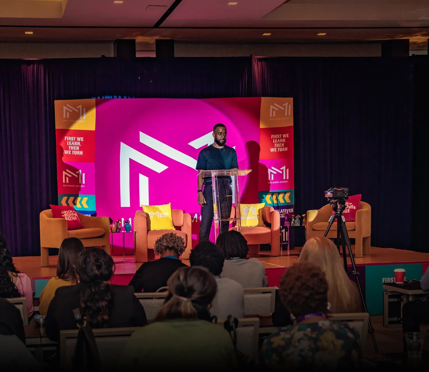 Codner delivers a keynote explaining how to buy a small business during an educational entrepreneurship conference.