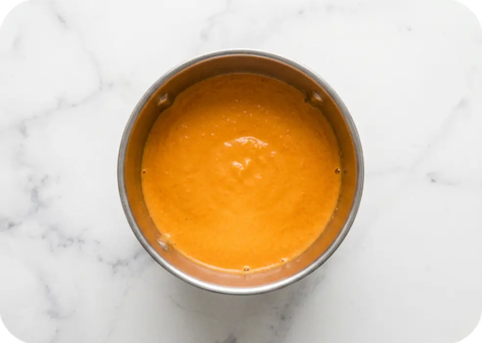 Grinned carrot to a smooth batter 