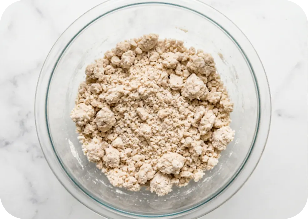a large bowl, the flour and oil.