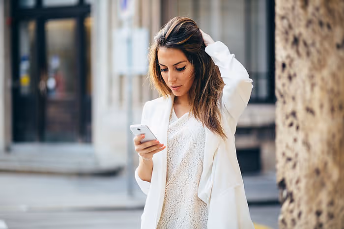 Woman looking at her smartphone.