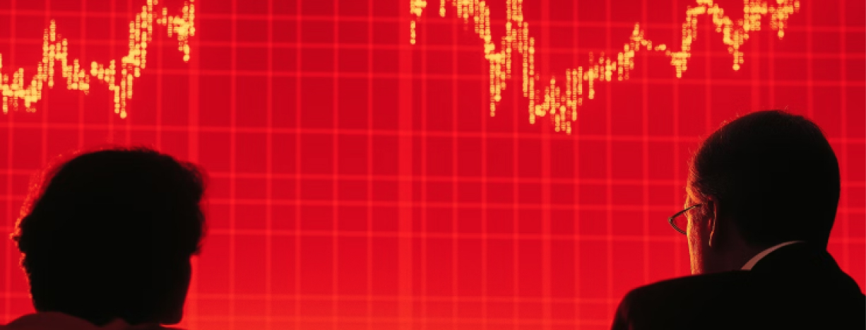 Close-up of computer circuit board with colorful blue, pink, and orange light patterns showing digital data processing