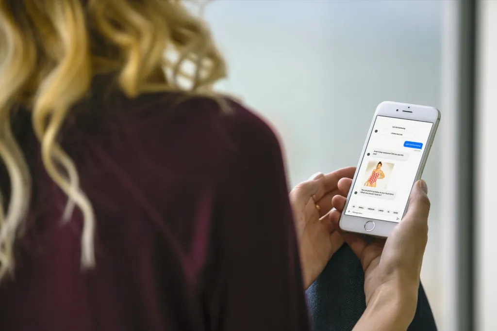 woman shopping for clothes through message