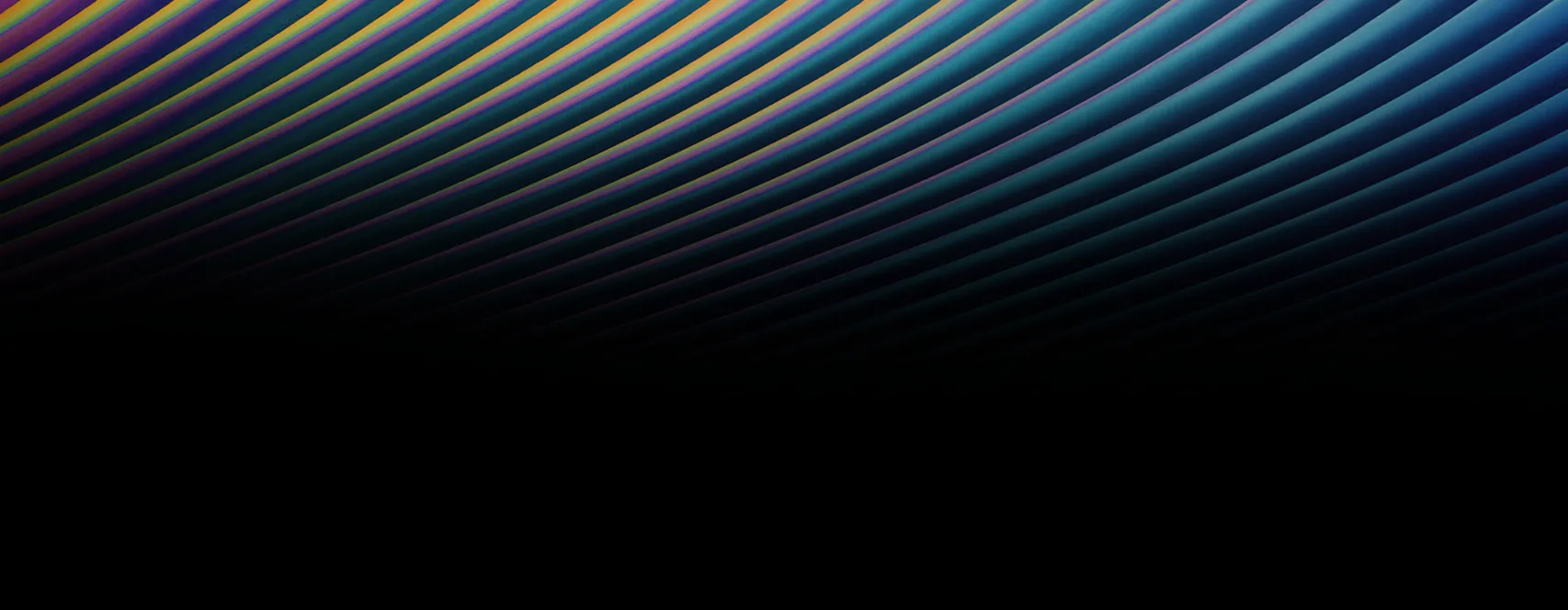 Close-up of a glass surface with diagonal, evenly spaced purple ridges on a dark background.