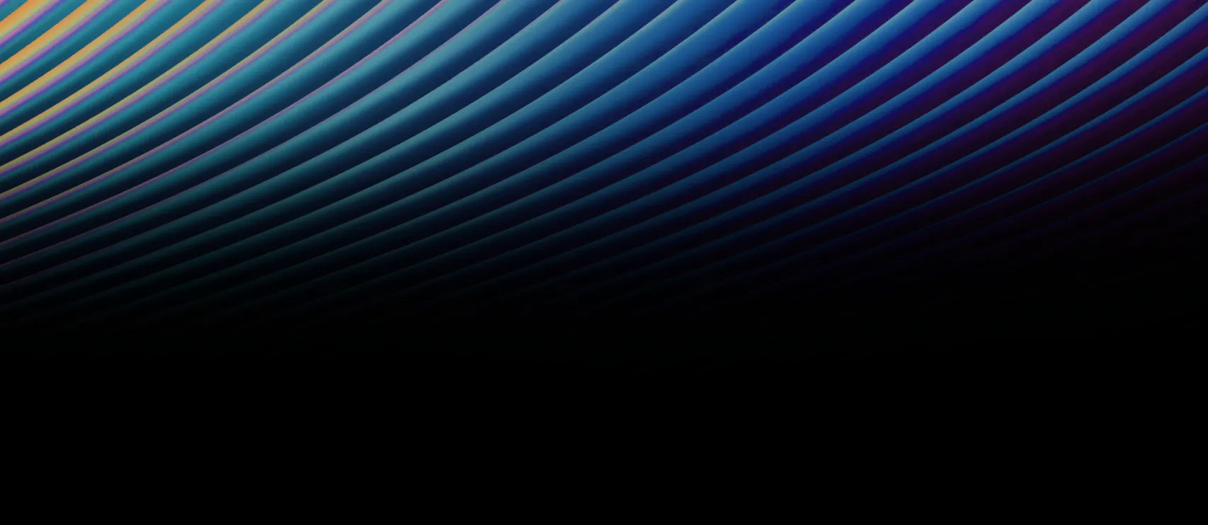 Close-up of curved, evenly spaced blue and black ridges creating a wave-like pattern with a hint of yellow on the left edge.