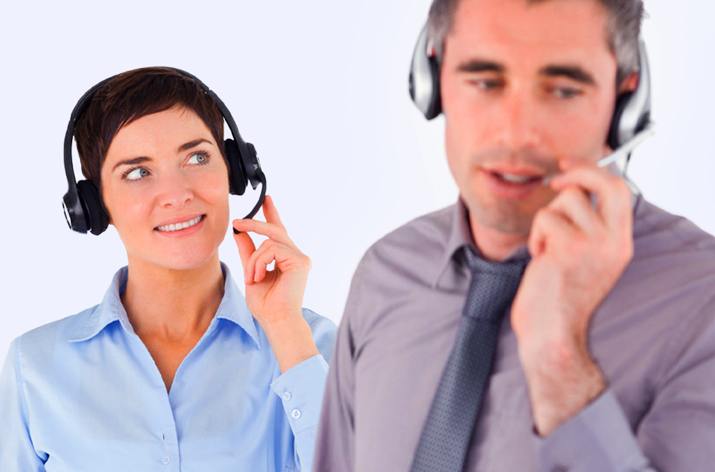 A woman and a man wearing call center headsets 