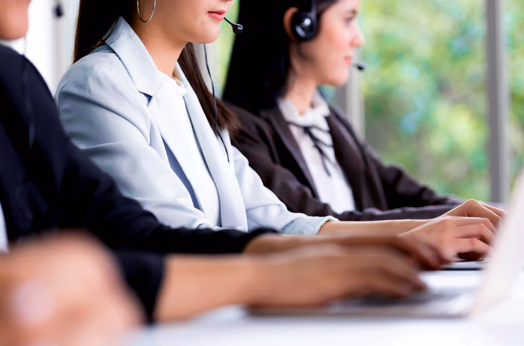 Call center employees at their workstation