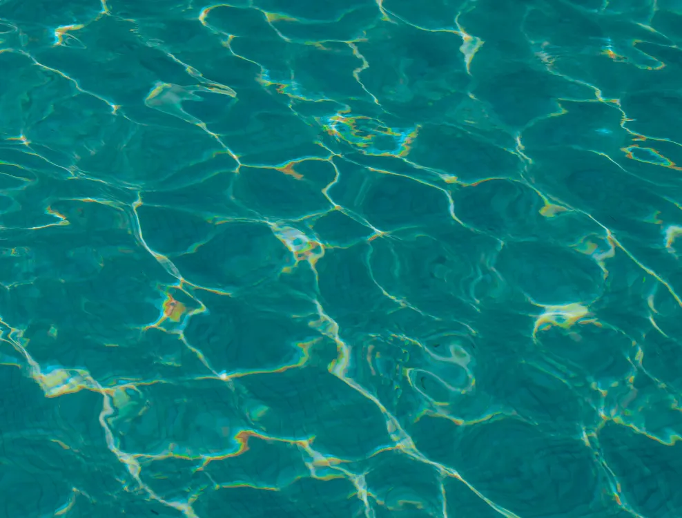 Turquoise reflections of the spa pool at the Relais d'Amboise, château hotel with pool on the banks of the Loire in Indre-et-Loire.