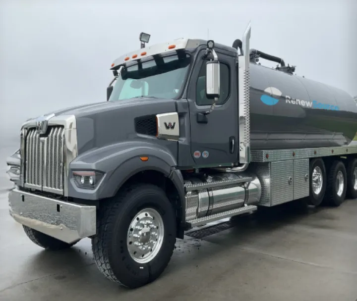 Gray heavy-duty tanker truck with a RenewSource logo on the tank.