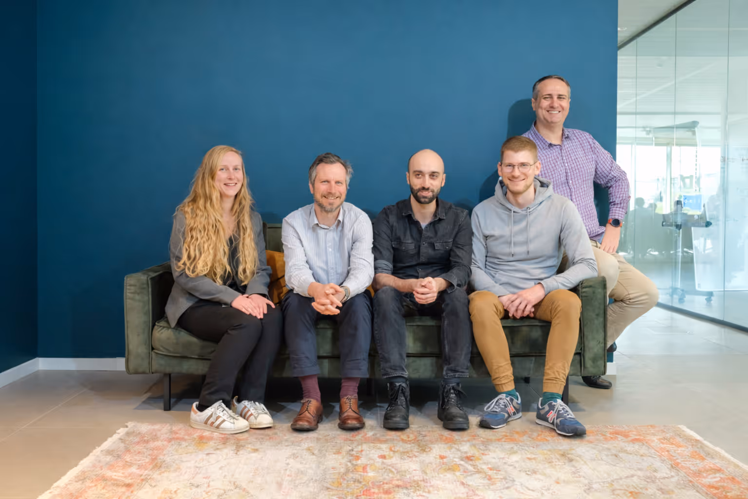 The Yields team sitting on a couch