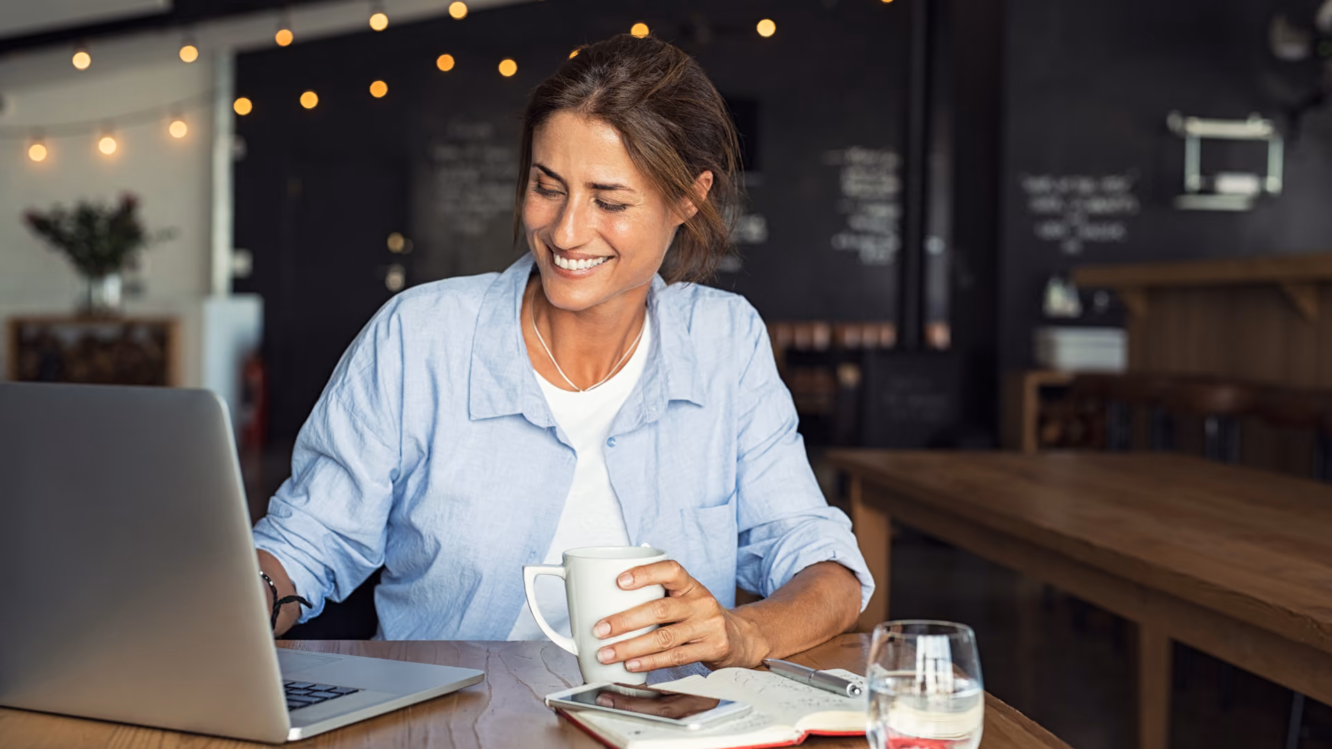 A risk leader reviewing models and AI over coffee