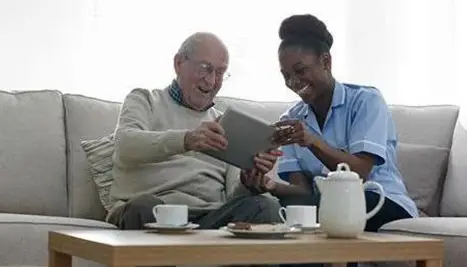 Live in care expert with elderly man 