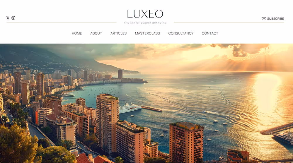 Aerial view of a coastal cityscape with high-rise buildings, a harbor with boats, and the sun setting over the ocean.