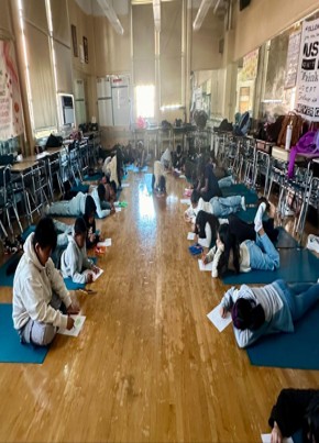 I.S. 126 students practicing mindfulness on yoga mats