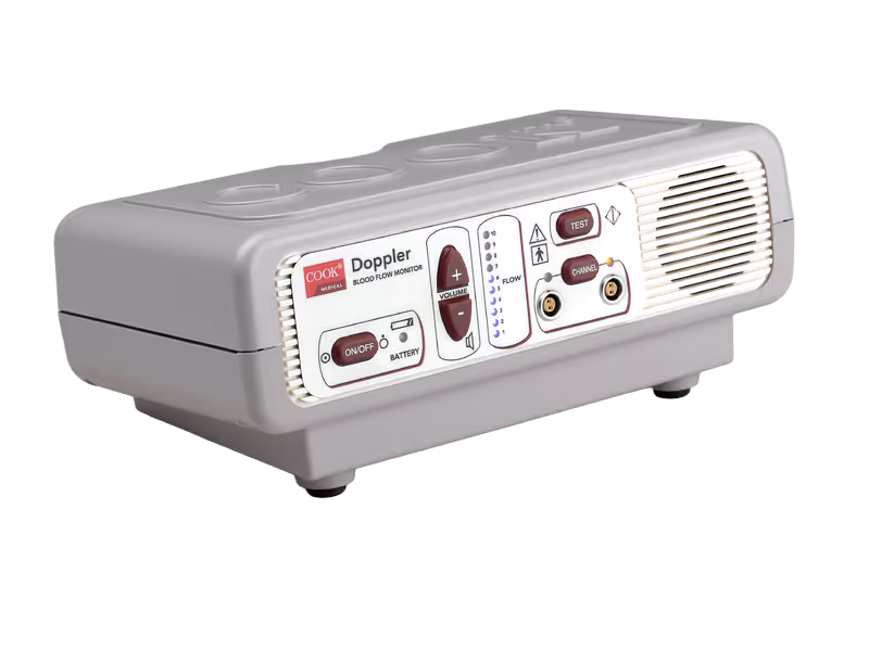 A Doppler ultrasound machine with buttons and controls on the front panel.