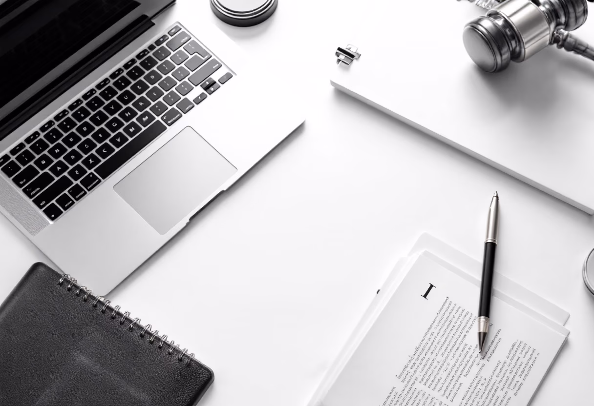 [background image] image of a work desk with a laptop and documents (for a ai legal tech company)