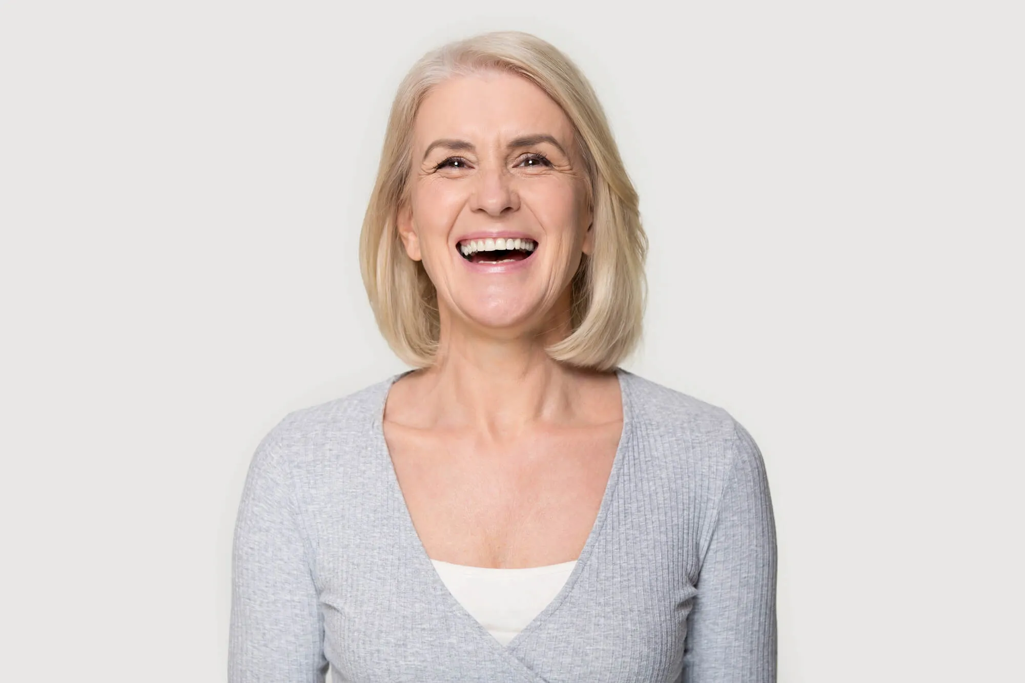 senior wearing dental implants in blue bell
