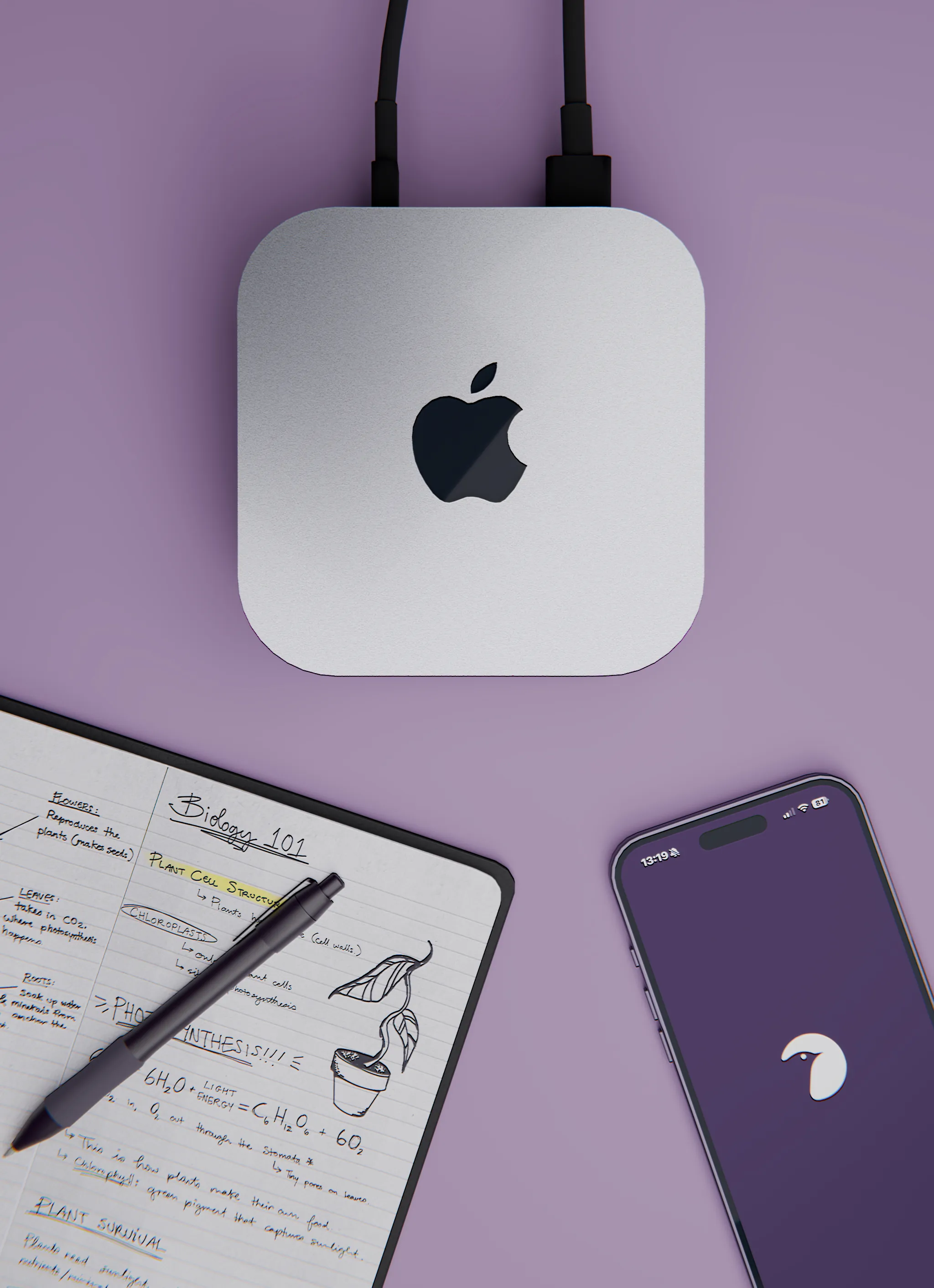 Silver Apple Mac mini with cables connected, a smartphone displaying Messenger Pigeon App, and an open notebook with biology notes and a pen on a purple surface.