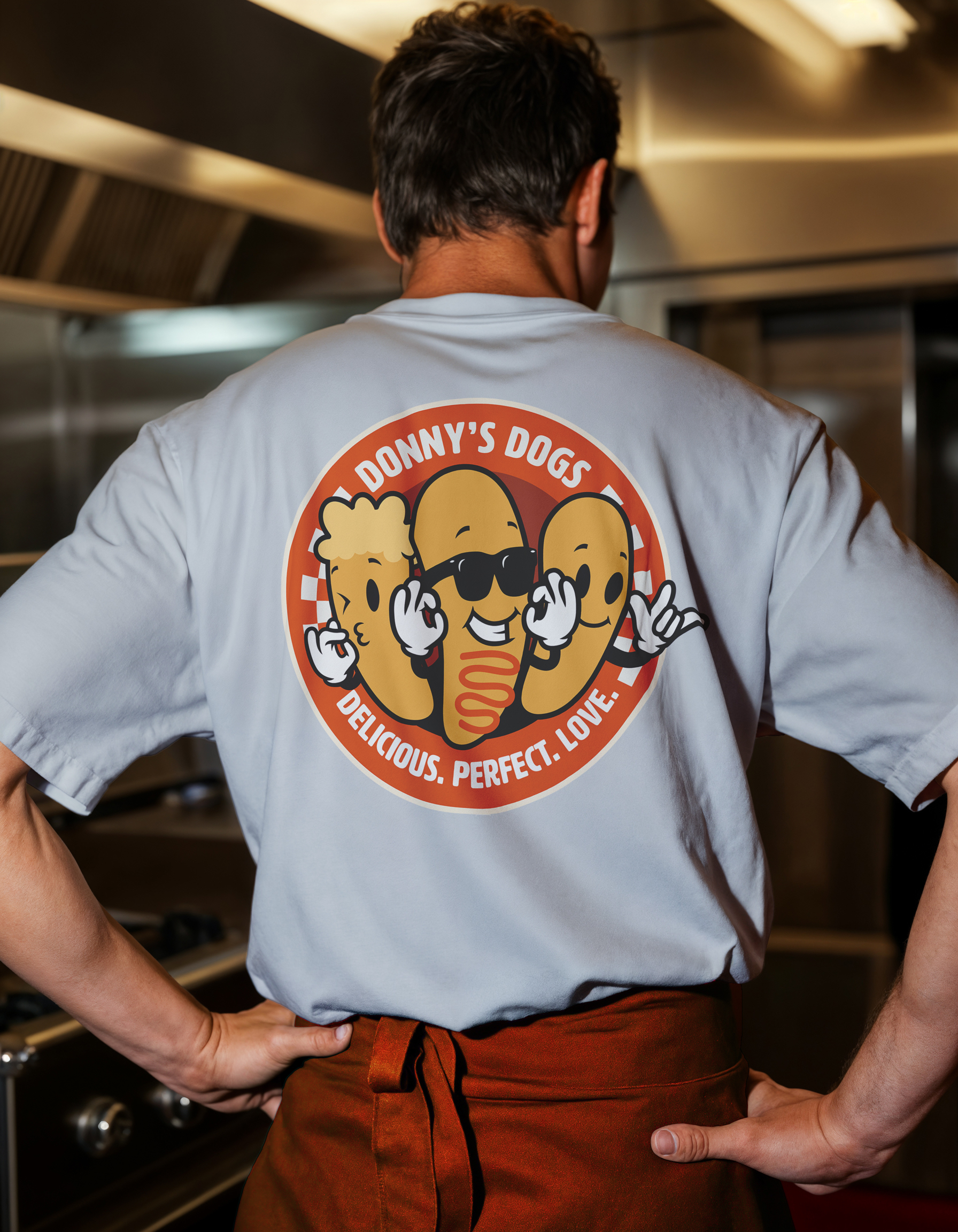 Back of a Donny's Dogs branded t-shirt showing the logo applied to apparel.