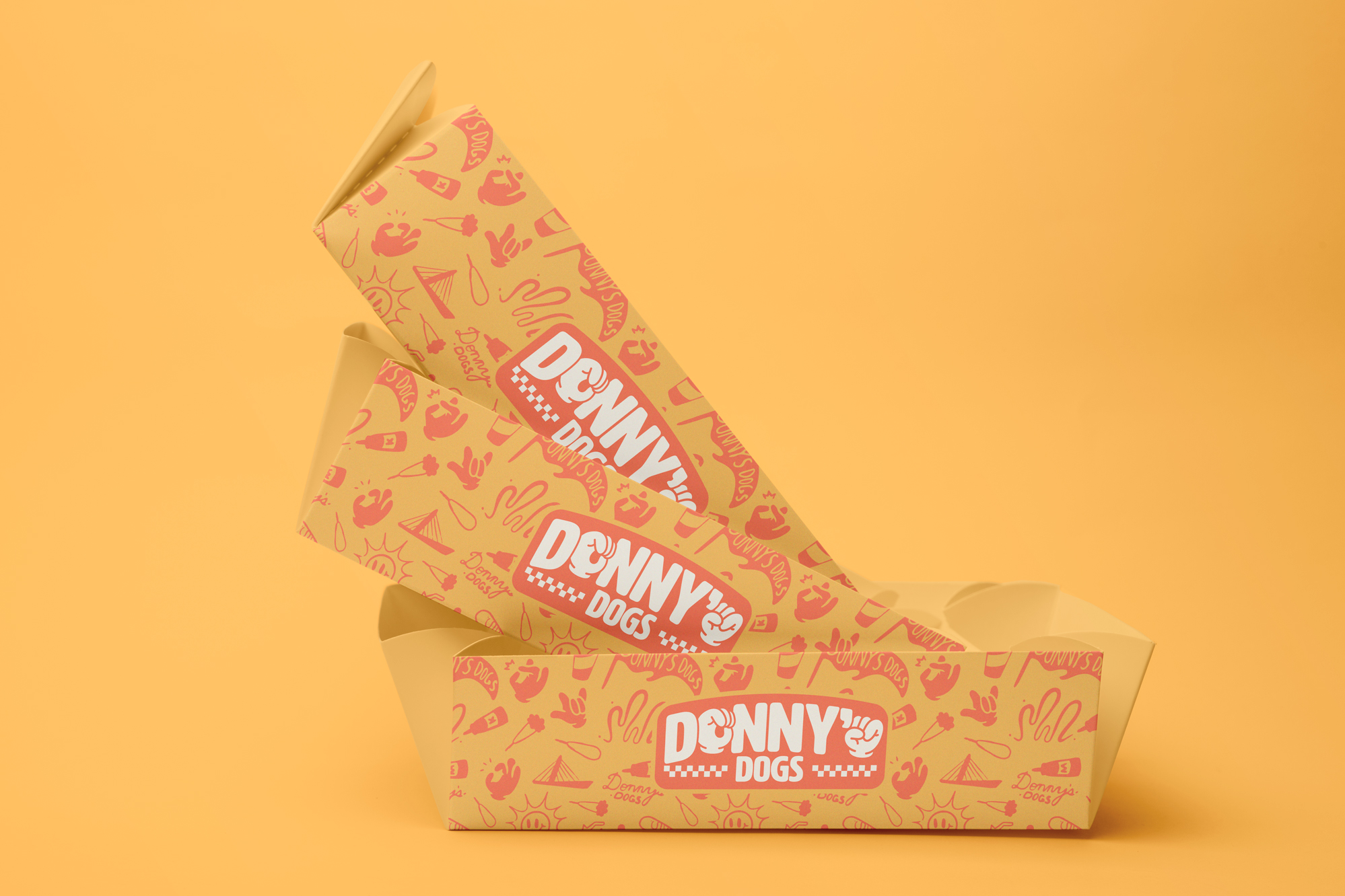 Donny's Dogs branded food tray with corn dogs ready to serve.