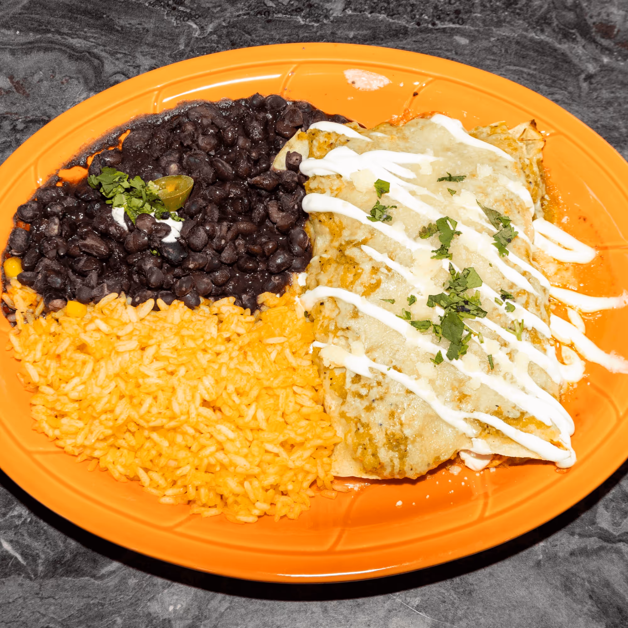 A plate of food with a variety of colors and textures.