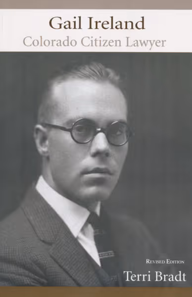 Black and white portrait of a man with glasses wearing a suit and tie on the cover of the book titled 'Gail Ireland Colorado Citizen Lawyer' by Terri Bradt.