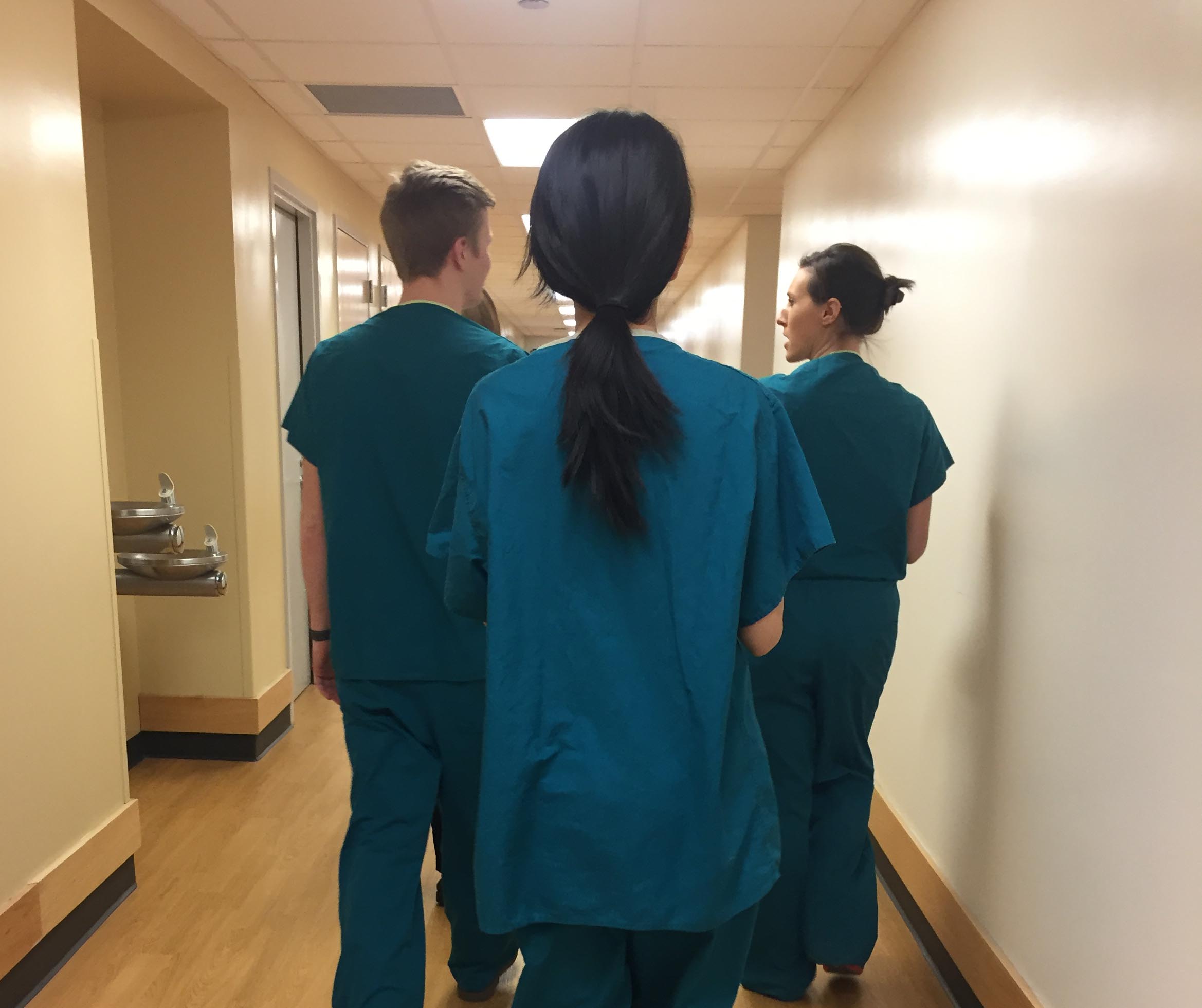 The project team dressed in scrubs, shadowing at Cincinnati Children's