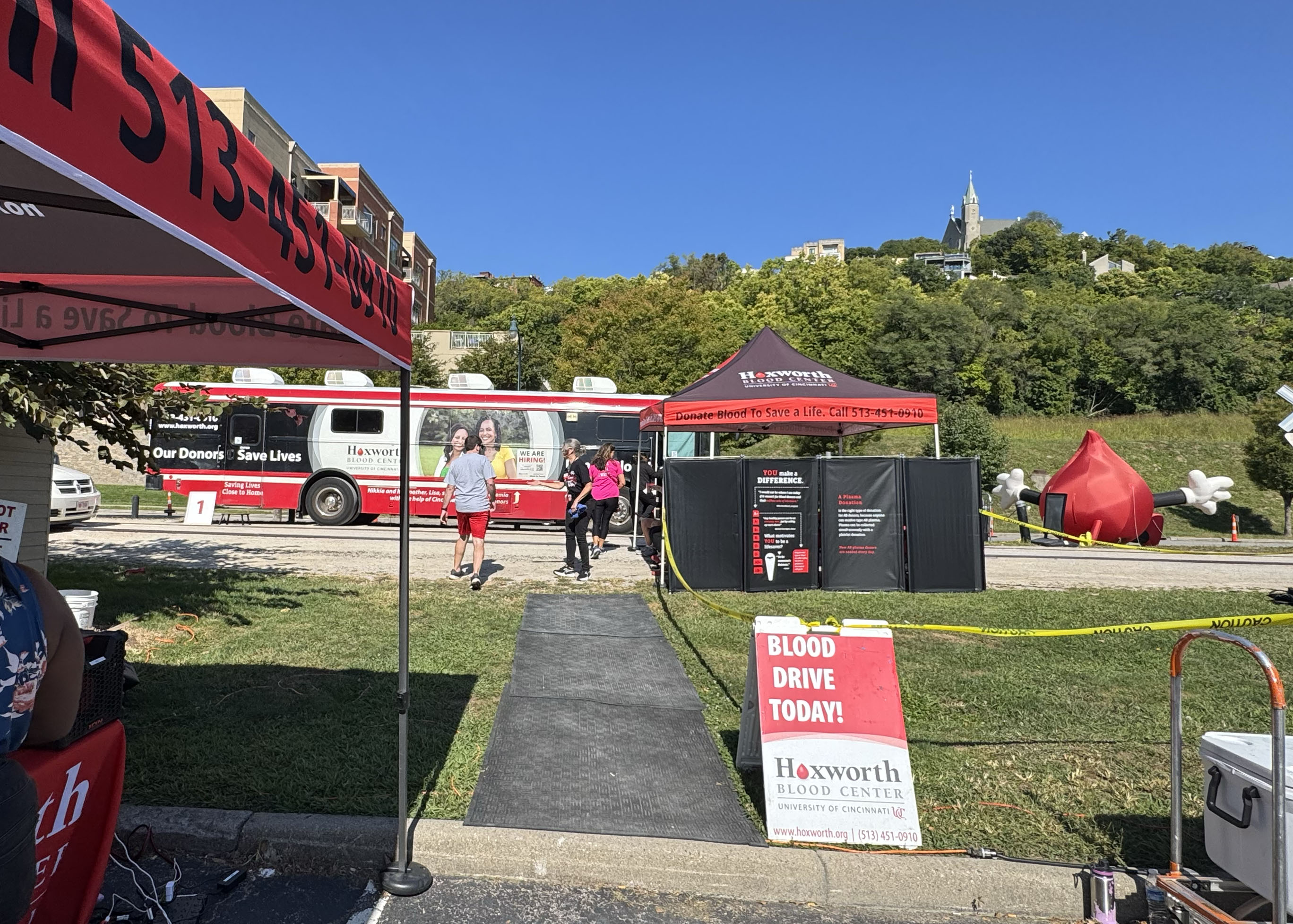 Signs givign directions to a mobile blood drive